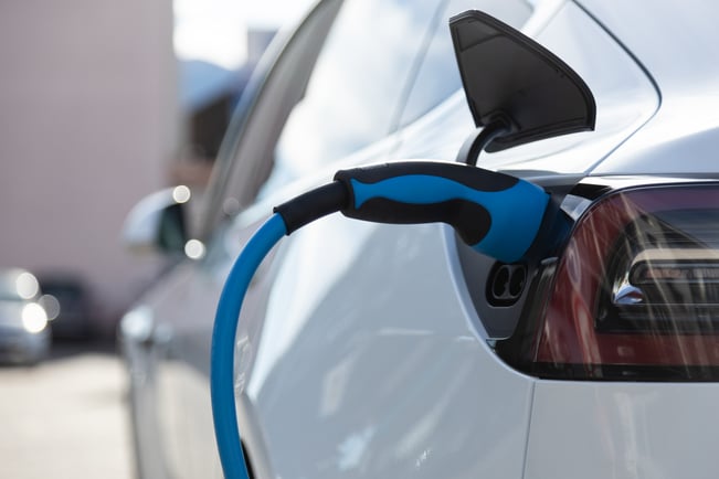ev-electric-car-pluged-charging-at-a-recharge-stat-2021-09-02-12-43-31-utc